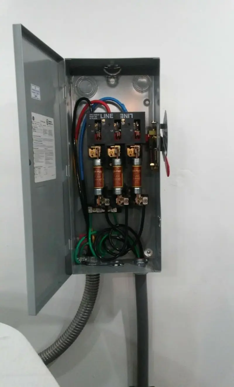Three-phase disconnect switch installed for Smoke Detector Installation in Bunnell
